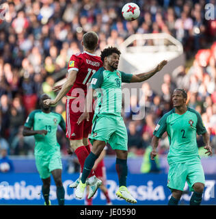 Moscow, Russia. 21st June, 2017. Eliseu (2nd R) of Portugal vies with Aleksandr Bukharov (2nd L) of Russia during FIFA Confederations Cup Russia 2017 Group A match between Russia and Portugal at Spartak Stadium in Moscow, Russia, on June 21, 2017. Portugal won 1-0. Credit: Evgeny Sinitsyn/Xinhua/Alamy Live News Stock Photo