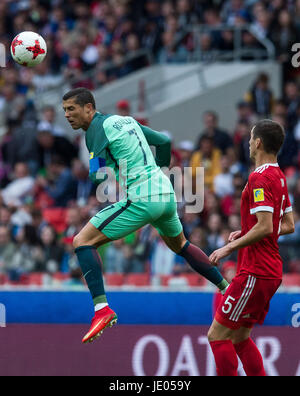 Moscow, Russia. 21st June, 2017. Cristiano Ronaldo (L) of Portugal heads the ball during FIFA Confederations Cup Russia 2017 Group A match between Russia and Portugal at Spartak Stadium in Moscow, Russia, on June 21, 2017. Portugal won 1-0. Credit: Evgeny Sinitsyn/Xinhua/Alamy Live News Stock Photo