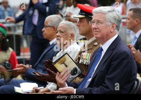 London, UK. 22nd Jun, 2017. Secretary of State for Defence Sir Michael Fallon and Baroness Howells of St Davids (r to l). A memorial honoring the two million African and Caribbean military servicemen and women who served in World War I and World War II, is unveiled in Windrush Square, Brixton, South London. Credit: Dinendra Haria/Alamy Live News Stock Photo