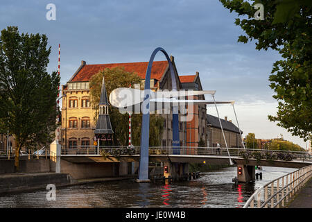 This bascule style bridge is build over a canal in leeuwarden and a gateway to the town center of Leeuwarden Netherlands. Stock Photo