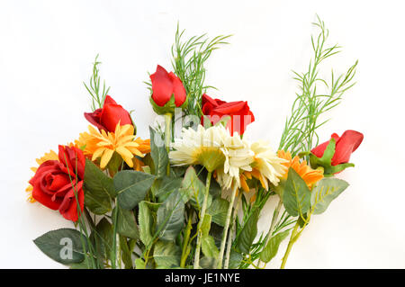 Bouquet of red roses and daisies on white background Stock Photo