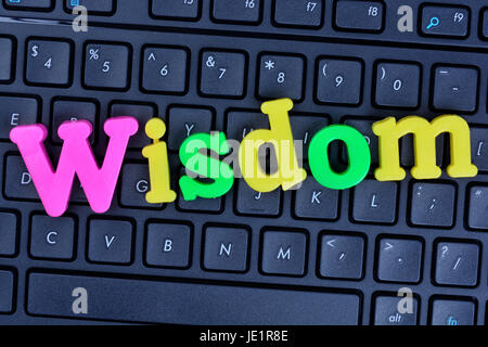 Wisdom word on computer keyboard closeup Stock Photo