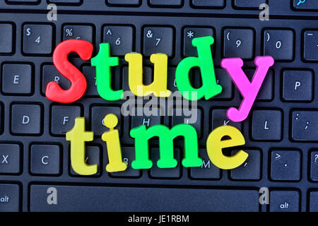 Study time words on computer keyboard closeup Stock Photo