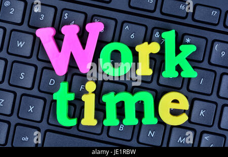 Work time words on computer keyboard closeup Stock Photo