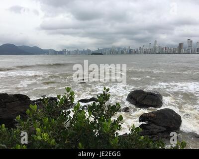 A photo of an amazing beach over the rocks Stock Photo