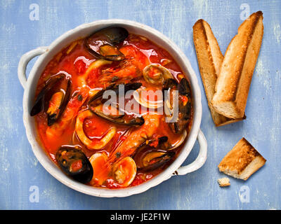 close up of a bowl of rustic italian seafood soup Stock Photo