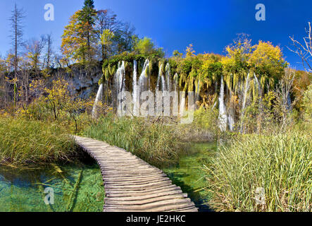 Walkway through paradise in Plitvice lakes national park of Croatia Stock Photo