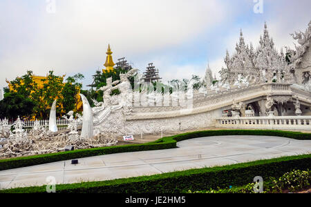 Wat Rong Khun in Chiang Rai, Thailand, the beautiful temple is integration of traditional Thai architecture and the surreal, more well-known of foreigners as the 'White Temple'. Stock Photo