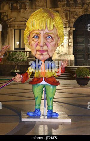 German Chancellor Angela Merkel recreated in papier-mâché at the Piazza del Duomo in Acireale. A few days after the Taormina G7, the craftsmen of the Carnival of Acireale, the world summit of May 26 and 27 was honored with the satire and the glittering colors of the carnascial tradition. French President Emmanuel Macron, Prime Minister Paolo Gentiloni, German Chancellor Angela Merkel, US President Donald Trump, British Theresa May, Canadian Justin Trudeau (Canada) and Japanese Shinzō Abe.  Where: Acireale, Sicily, Italy When: 22 May 2017 Credit: IPA/WENN.com  **Only available for publication i Stock Photo