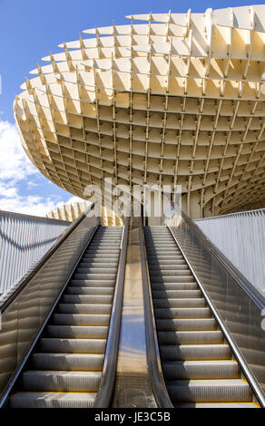 SEVILLE, SPAIN - MAY 2014: Metropol Parasol in Plaza de la Encarnacion on 31 of May 2014 in Sevilla,Spain. A new Seville Market Hall and attractive destination. Projected by J. Mayer H. architects, it is made from bonded timber with a polyurethane coating. Stock Photo
