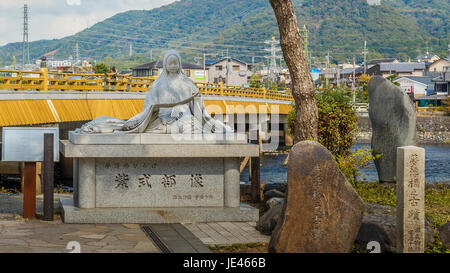 Murasaki Shikibu statue in Uji District- A Japanese novelist, poet and lady-in-waiting at the Imperial Court in Heian Period Stock Photo