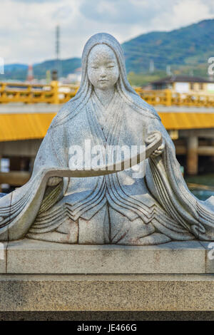 Murasaki Shikibu statue in Uji District- A Japanese novelist, poet and lady-in-waiting at the Imperial Court in Heian Period Stock Photo