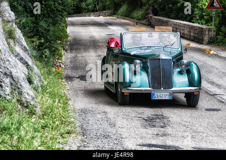 GOLA DEL FURLO, ITALY - MAY 19: LANCIA APRILIA CABRIOLET 1940 on an old racing car in rally Mille Miglia 2017 the famous italian historical race (1927 Stock Photo