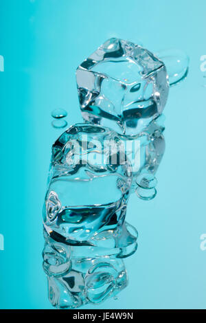 Acrylic ice cubes and drops of water. Stock Photo