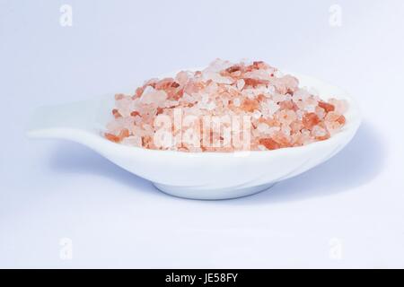 Himalayan salt on white background Stock Photo