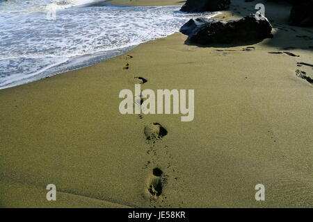 Footprints in the Sand Stock Photo