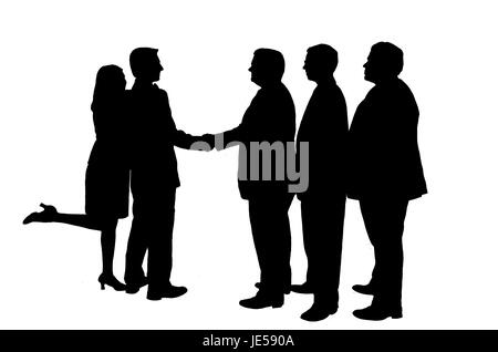 Silhouetted businessmen in a shaking hand pose. Stock Photo
