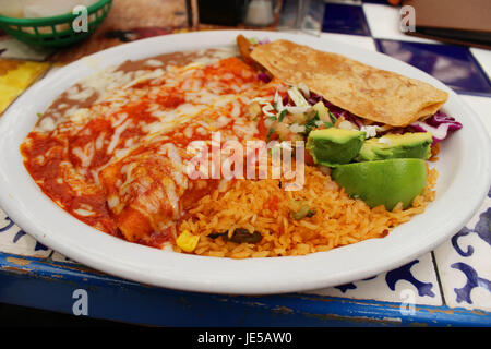 Enchiladas and Fish Taco with Rice and Beans Stock Photo