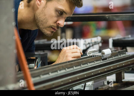 Man working in factory Stock Photo