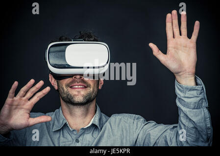 Man using virtual reality simulator Stock Photo