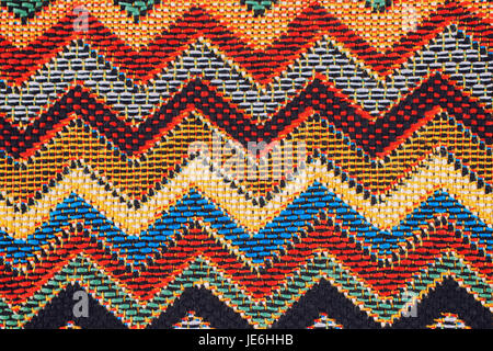 Texture of  fabric with  traditional Mexican pattern macro. A tissue sample Stock Photo
