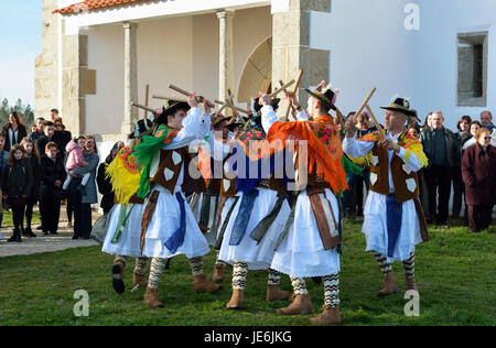 A folk group (Pauliteiros de Miranda) that practice an ancient warrior Iberian dance. Traditional Winter festivities in Constantim. Portugal Stock Photo