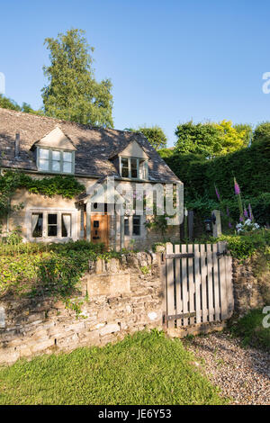 Upper Slaughter in the late evening june sunshine. Cotswolds, Gloucestershire, England Stock Photo