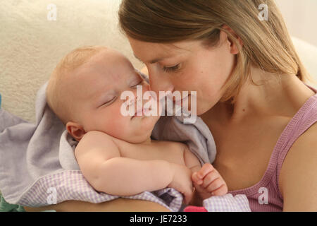 Nut, baby, 4 months, sleep, cuddle, dresses, Indoor, girls, people, woman, suture, touch, portrait, curled, happily, smile, tenderness, security, motherly love, Stock Photo