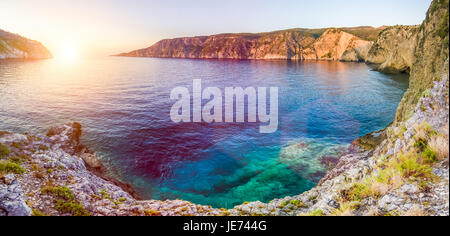 Mediterranean bay at sunset in Assos, Kefalonia, Greece Stock Photo