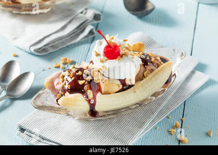 Sweet Homemade Banana Split Sundae with Chocolate Vanilla  Strawberry Ice Cream Stock Photo