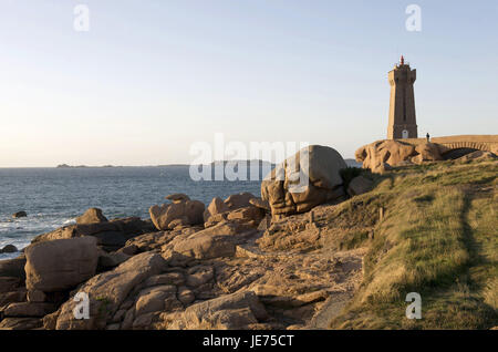 Europe, France, Brittany, Cote de granite rose, Ploumanach, lighthouse in coastal scenery, Stock Photo