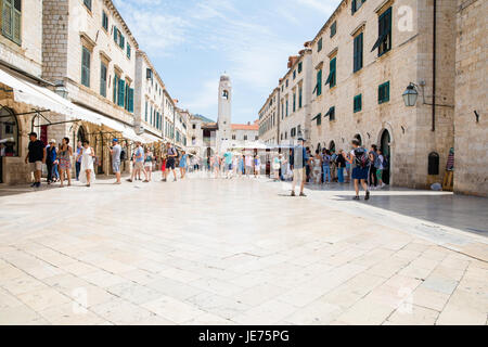 Marble paving polished by centuries of human feet on the Stradun the main street of the Old City of Dubrovnik Croatia Stock Photo