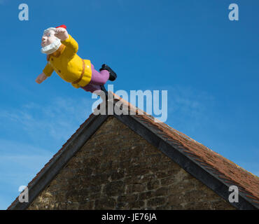 Leaping Gnome sculpture by Serbian artist Djordje Ozbolt greeting visitors to the Hauser and Wirth gallery at Bruton in Somerset UK Stock Photo