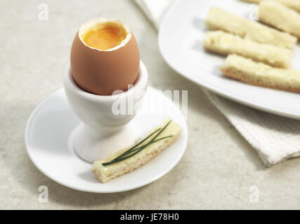 boiled egg, eggcup, bread, Stock Photo
