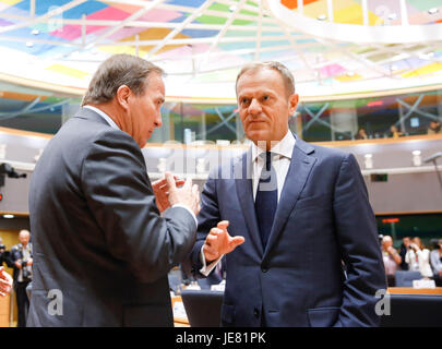 Brussels, Belgium. 23rd June, 2017. Swedish Prime Minister Stefan Lofven (L) talks with European Council President Donald Tusk at the second day of EU Summit in Brussels, Belgium, June 23, 2017. Credit: Ye Pingfan/Xinhua/Alamy Live News Stock Photo