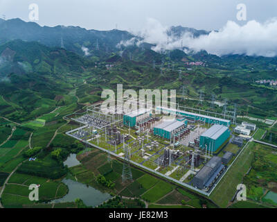 Jinhua. 23rd June, 2017. Photo taken on June 23, 2017 shows the convertor station in Jinhua of east China's Zhejiang Province. The Sichuan Xiluodu-Zhejiang Jinhua 800 KV ultra-high voltage (UHV) direct current (DC) power transmission project, one of the world's largest DC power transmission projects in terms of capacity, has transmitted over 100 billion kwh clean hydropower into Zhejiang by now. Credit: Xu Yu/Xinhua/Alamy Live News Stock Photo