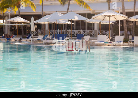 Old couple in the pool of Hotel Melia Cayo Coco, Cayo Coco, Cuba Stock Photo