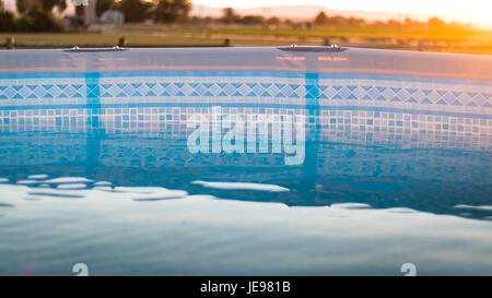 When the temperature is nearly 100F, a dip in the water fixes everything. Stock Photo