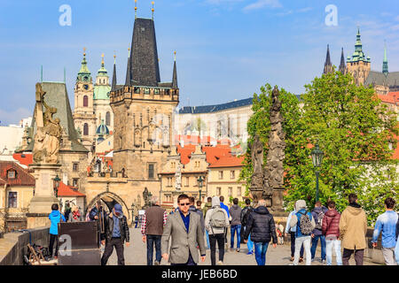 PRAGUE, CZECH REPUBLIC - APRIL 14,2016: Charles Bridge (Karluv Most) and Old Town Tower at blue sky, Prague, Czech Republic.This bridge is the oldest  Stock Photo