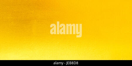 Gold foil texture background  backdrop smooth seamless abstract. Stock Photo