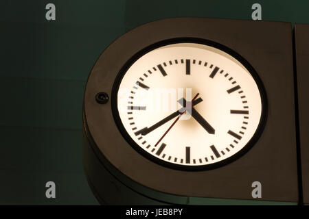 White Clock isolated at the train station close up Stock Photo