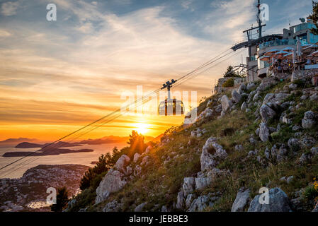 The Dubrovnik Cable Car decends Mount Srd and gives tourists an amazing view at sunset. Stock Photo