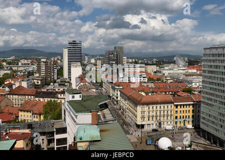 Elevated view of Ljubljana capital city of Slovenia north from the Skyscraper to the Kamnik Savinja Alps under clouds Stock Photo