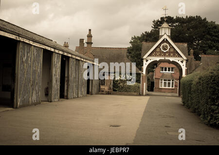 famous Bletchley Park house and grounds rear garages England as in the imitation game enigma code historical stables code breaking sypher intelligence Stock Photo