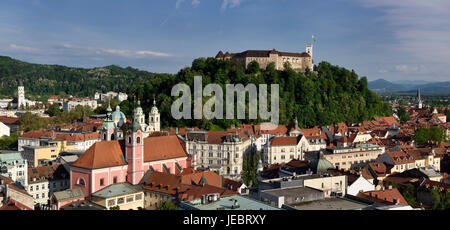 View of Old Town of Lubljana Slovenia from the Skyscraper of churches of St Joseph, St Nicholas, Franciscan and St James with hilltop Castle Stock Photo