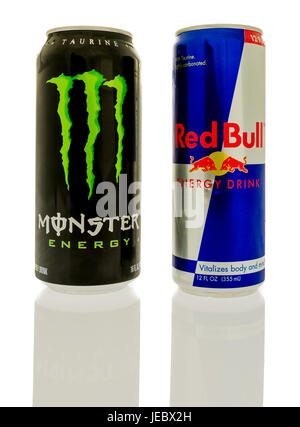 Winneconne, WI -17 June 2017: Cans of Red Bull and Monster energy drinks, the top two selling energy drinks in the world, on an isolated background Stock Photo