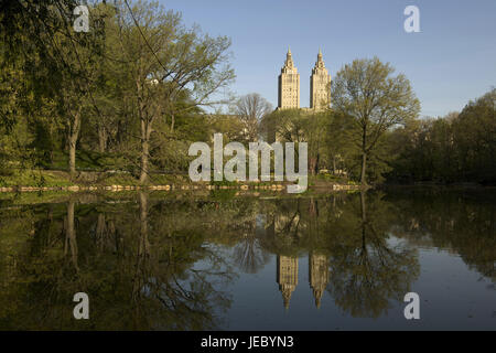 The USA, America, New York, Manhattan, Central park, view over the lake on the Century Building, Stock Photo