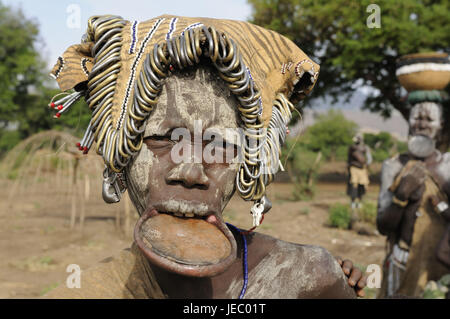 Man, tribe Mursi, lip plate, headdress, Mago national park, southern Omotal, south Ethiopia, Stock Photo