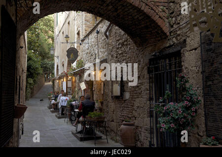 Italy, Tuscany, La Maremma, Massa Marittima, Old Town, street cafe in a small lane, Stock Photo