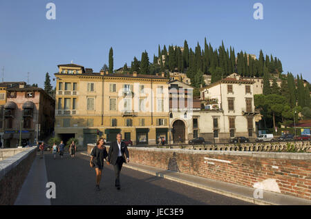 Italy, Veneto, Verona, person on the bridge about the Ponte Pietra, Stock Photo